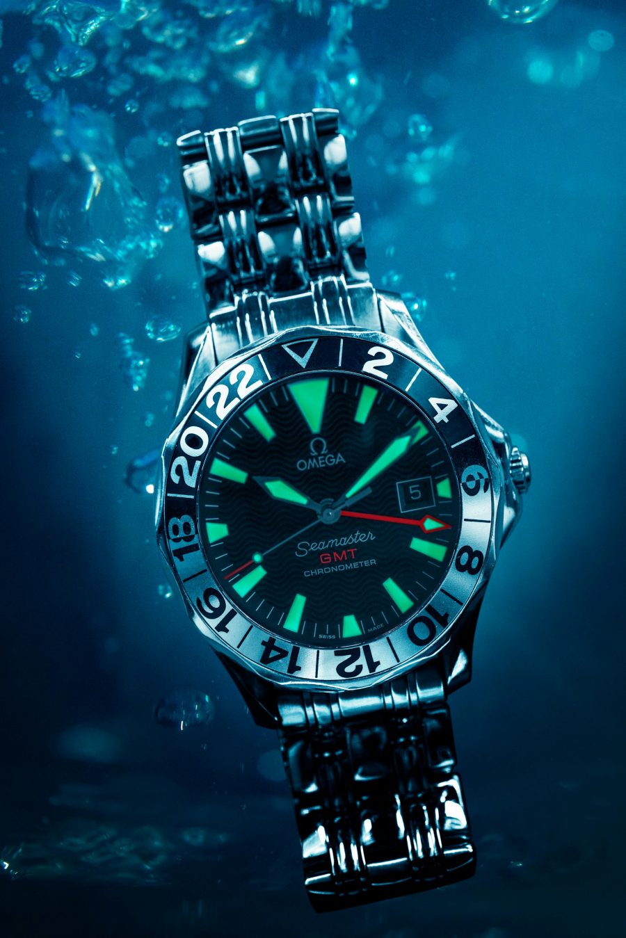 Watch shown with water for water-resistance testing theme